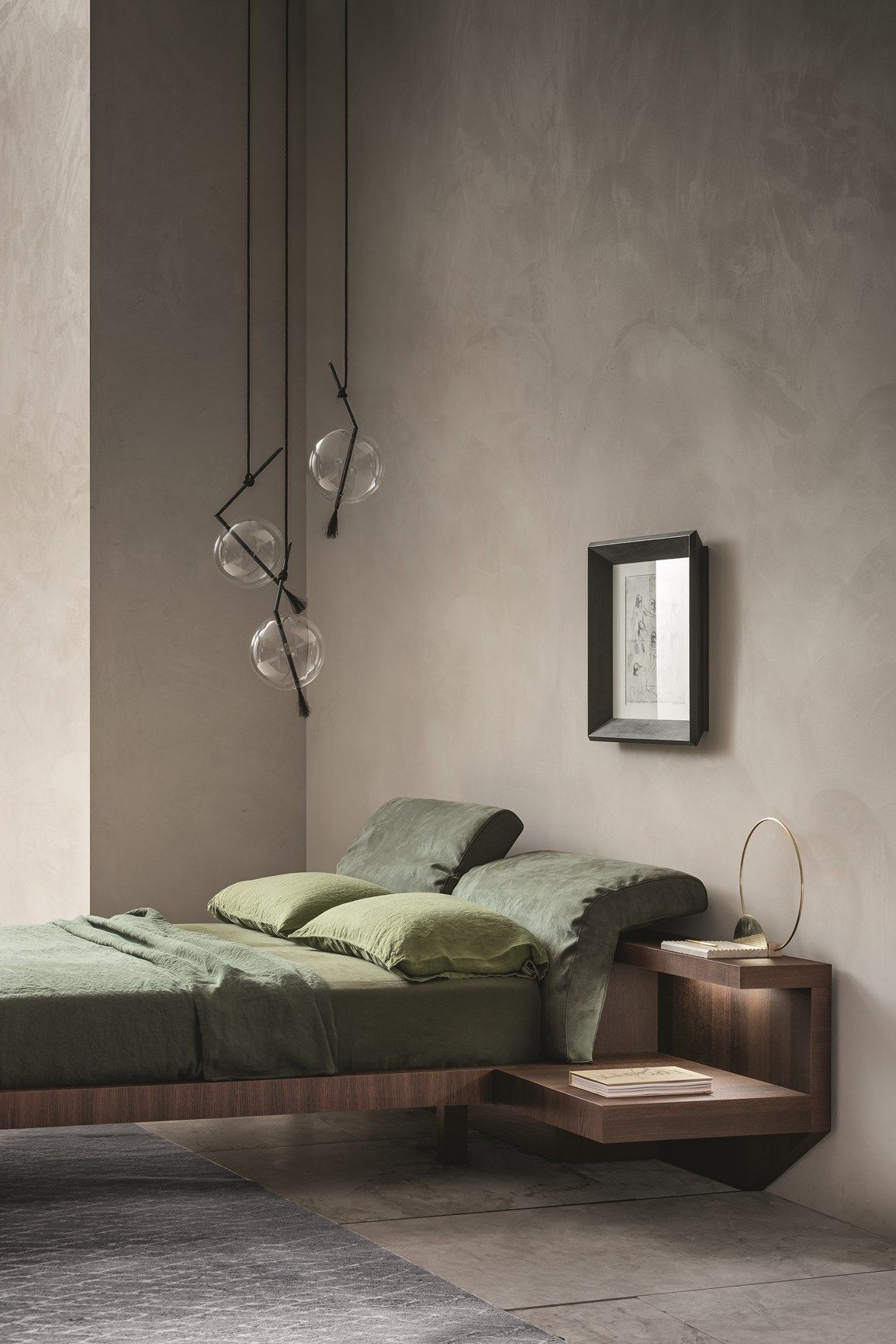 Bedroom with sage linen and sculptural pendant lighting